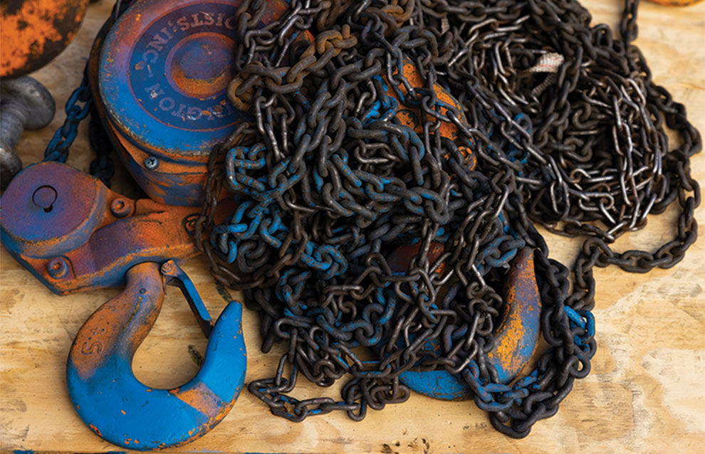 pile of heavy chains and hooks on the ship. 